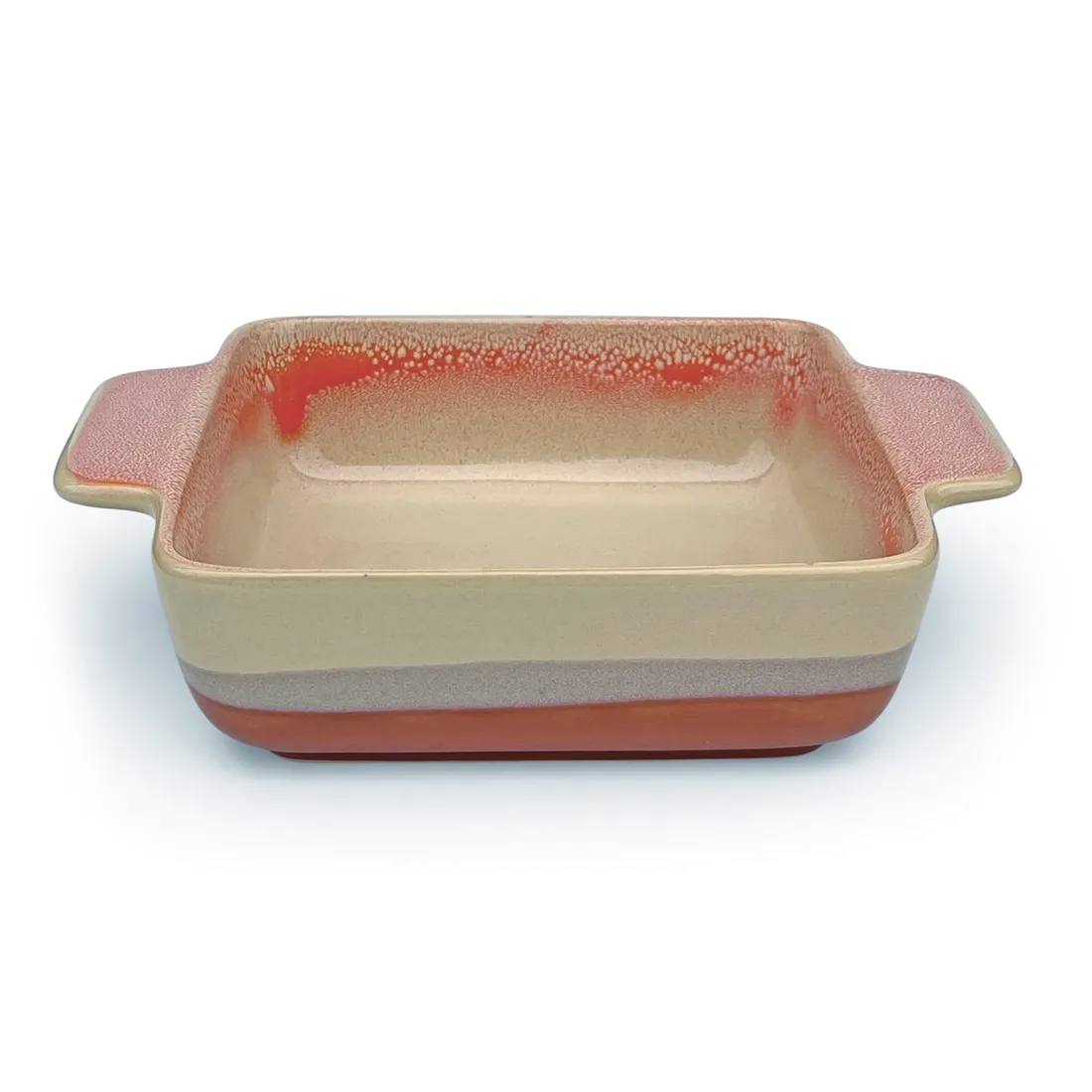 A square oven dish in a reactive glaze of terracotta hues, featuring two curved handles and a smooth interior.