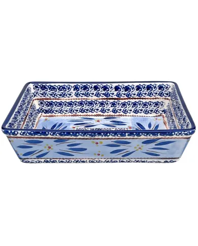 Rectangular ceramic oven dish with intricate blue and yellow floral patterns on a white background.