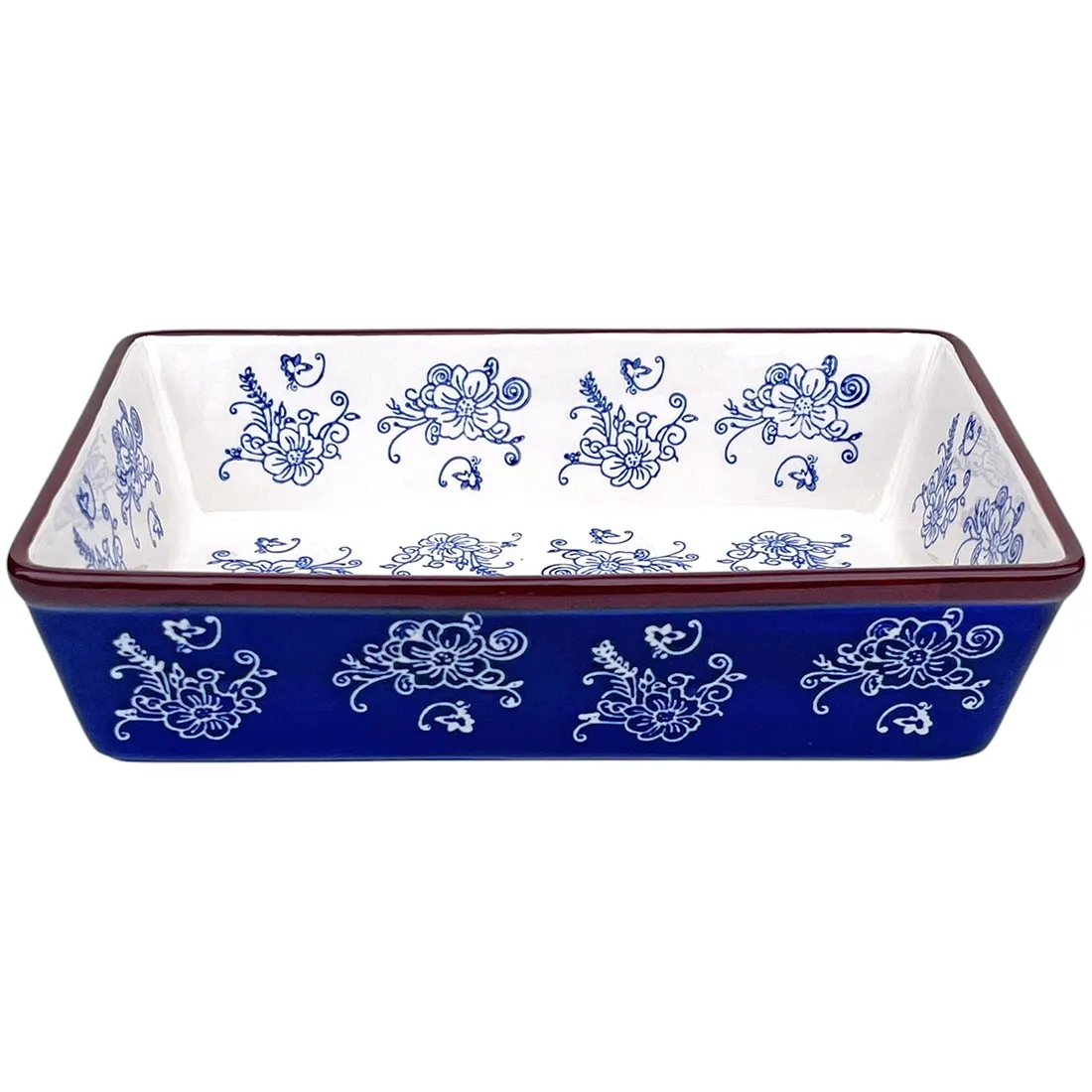 Rectangular white oven dish with blue floral patterns and a brown rim.