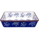 Rectangular white oven dish with blue floral patterns and a brown rim.