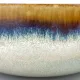 A close-up of the reactive glaze detail of the bohemian soup bowl.