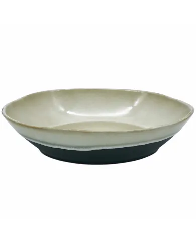 Tweekleurige grote salade schaal met een gladde beige binnenkant en een contrasterende zwarte bodem.