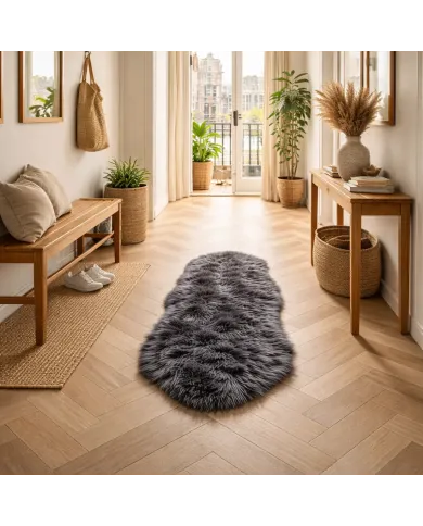 Entryway with a grey sheepskin rug, wooden bench, woven baskets and houseplants.