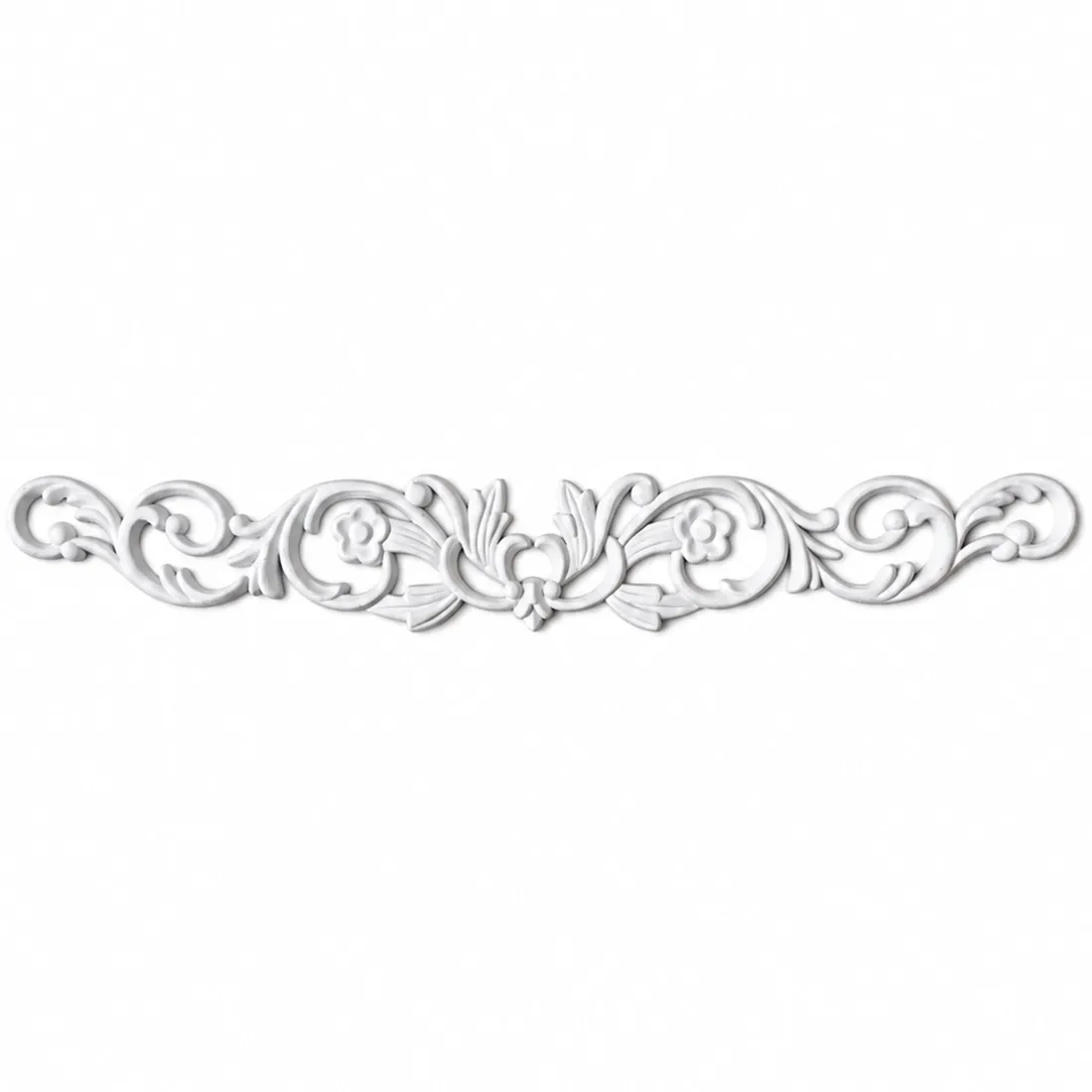 An ornate white decorative furniture applique featuring delicate flowers and fine scrollwork.