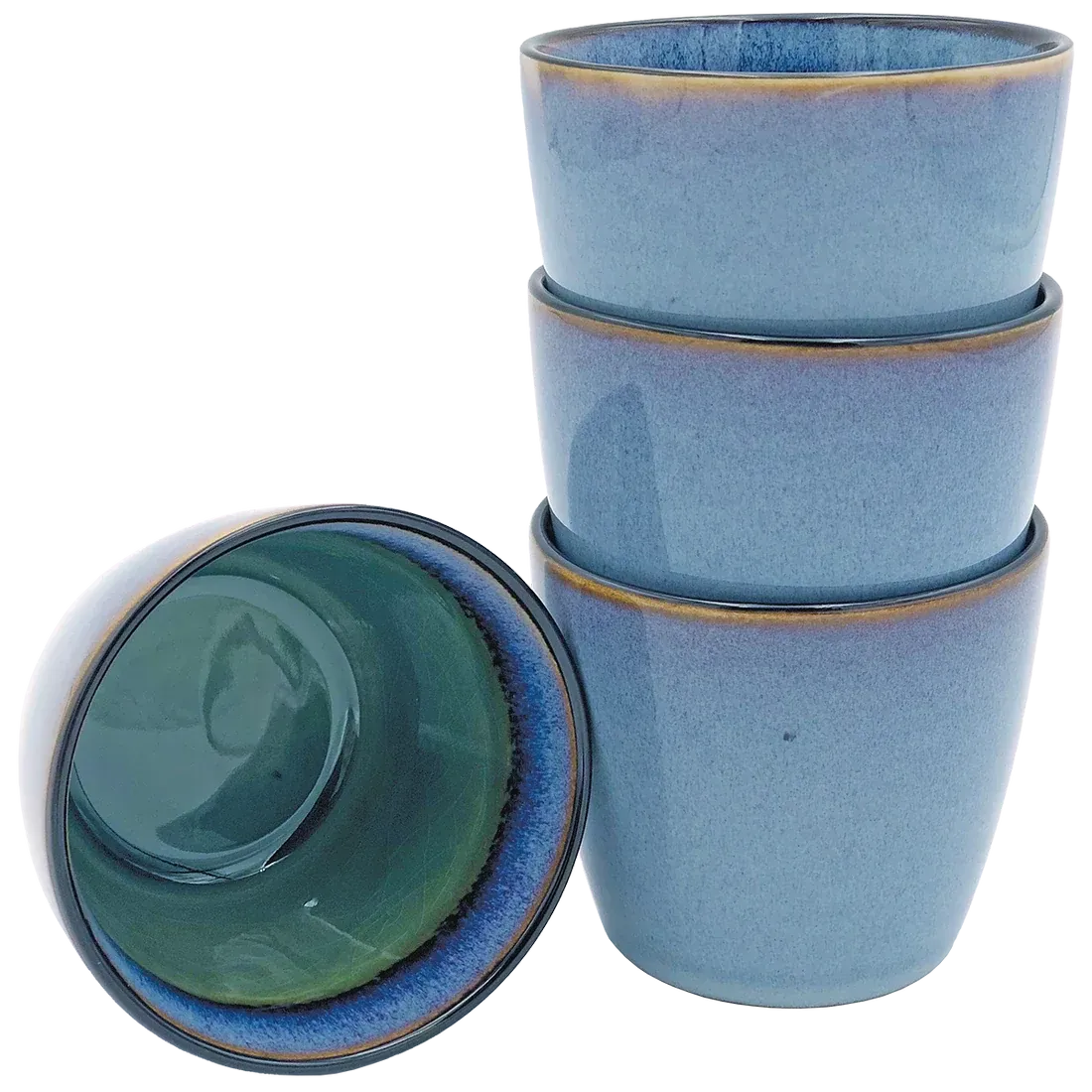 Blue cappuccino mugs stacked with one inverted to show green interior.