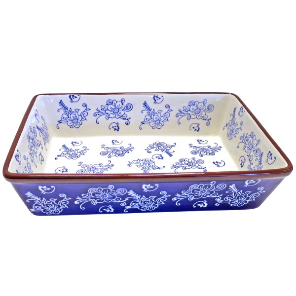 Rectangular white oven dish with blue floral patterns and a brown rim.