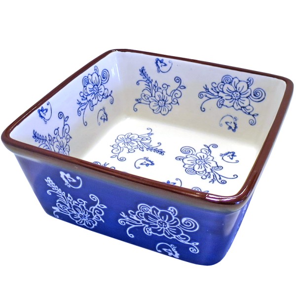 Square ceramic dish with intricate blue floral patterns on a white background.